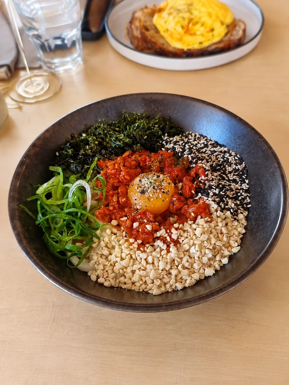 Maze Udon with egg yolk, sesame and nori