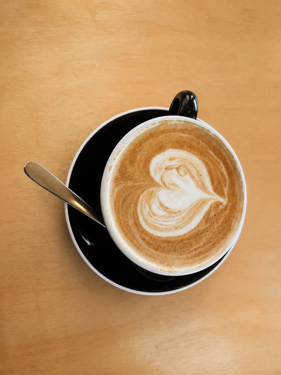 Latte art in a cup of coffee